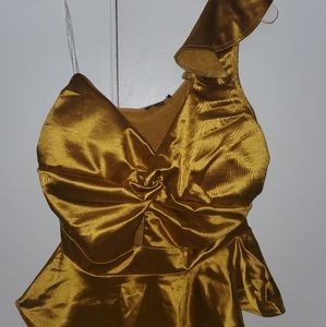 Beautiful brand new 1 shoulder glod top.